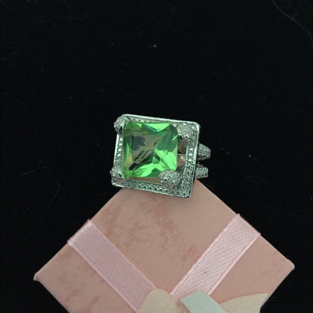Sterling silver ring with green gemstone